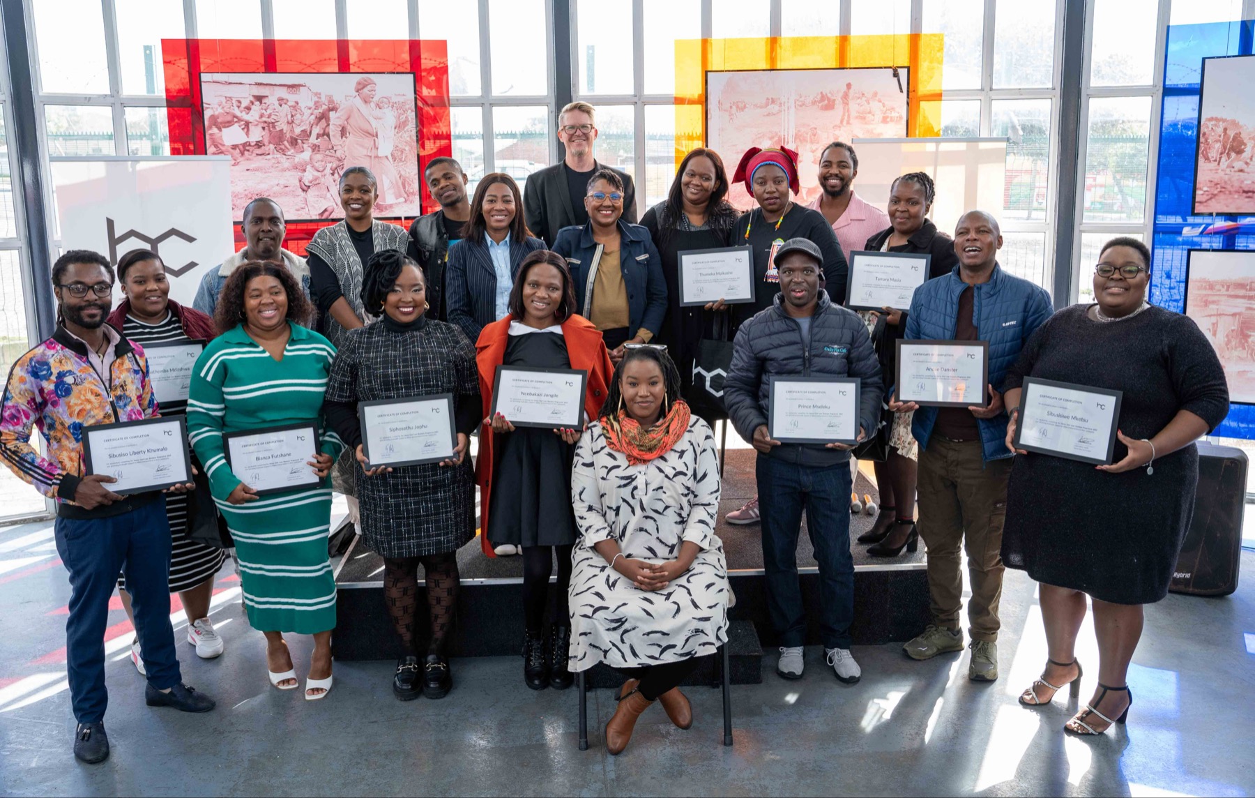 Community Business Programme graduates holding Heavy Chef certificates
