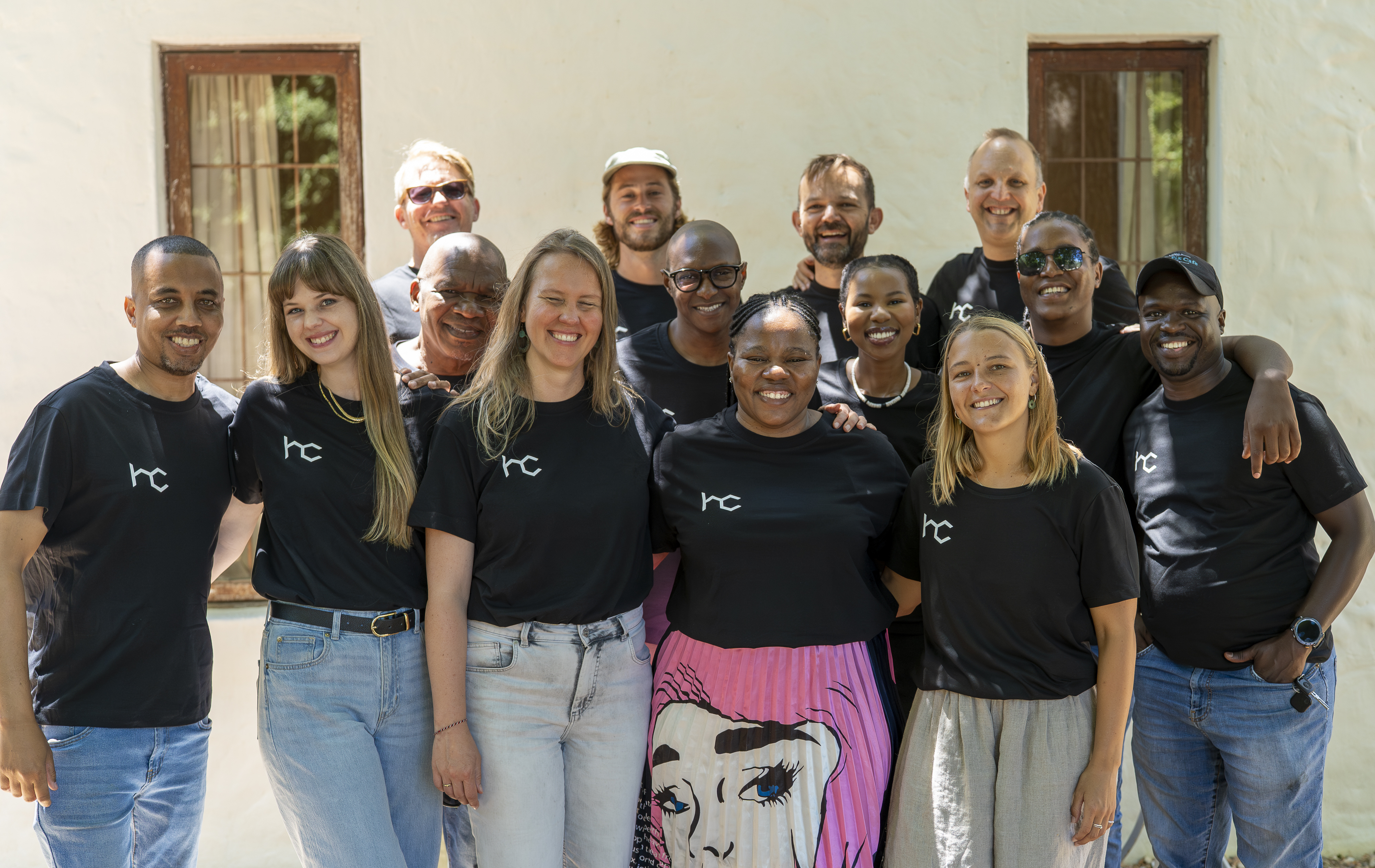 Heavy Chef team members together wearing branded shirts